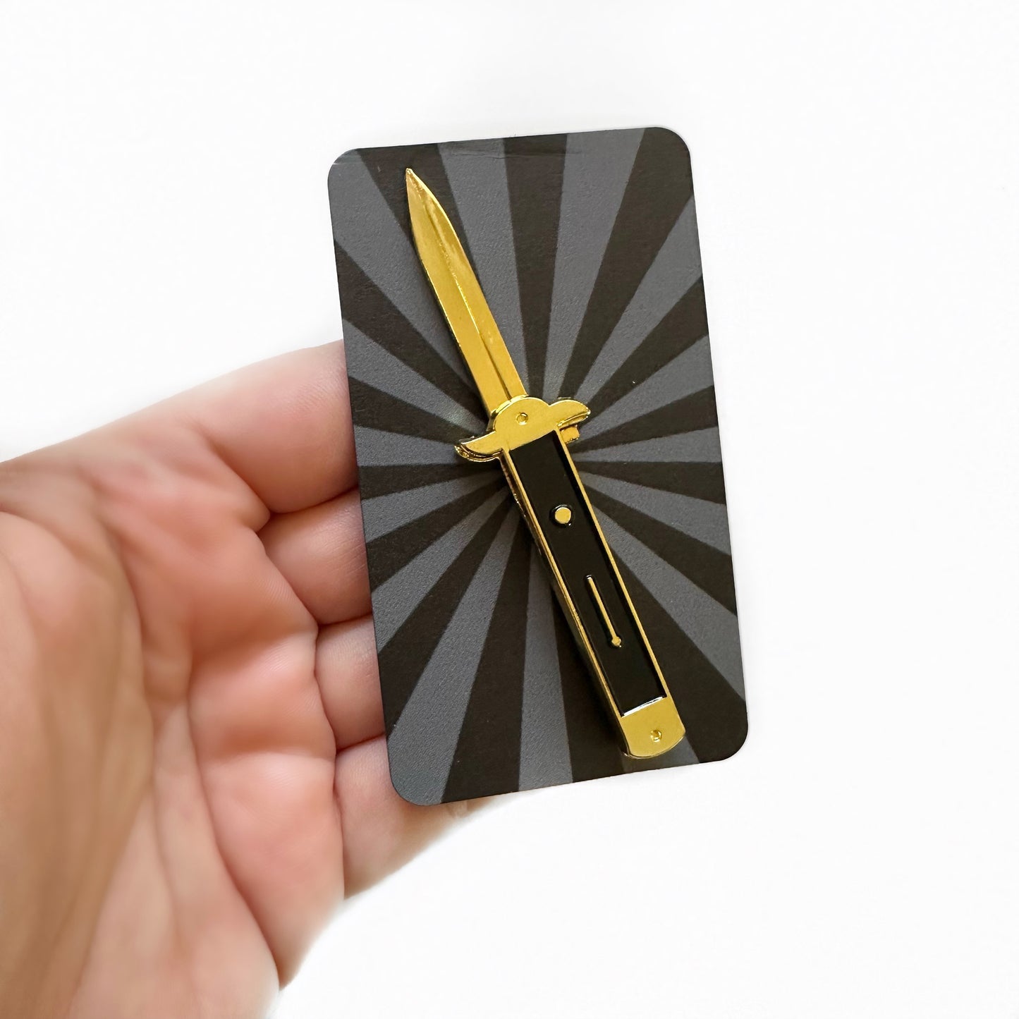 Gold and Black Switchblade Pin-Subscriber Only